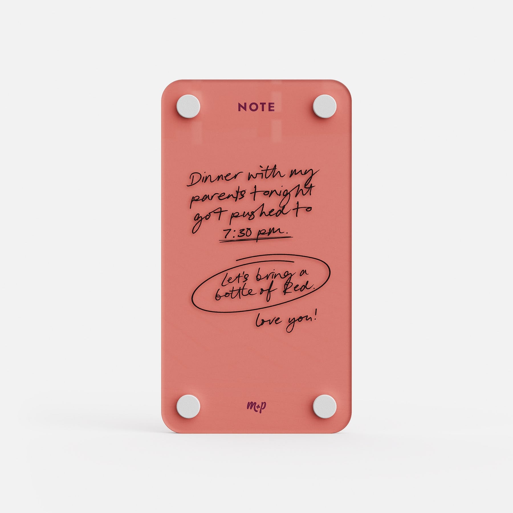 Coral tall magnetic acrylic note board with a handwritten message about dinner moving to 7:30